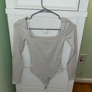 Aritzia size 2XS cream bodysuit!